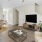 a living room with a tv and furniture