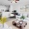 a living room with a fan