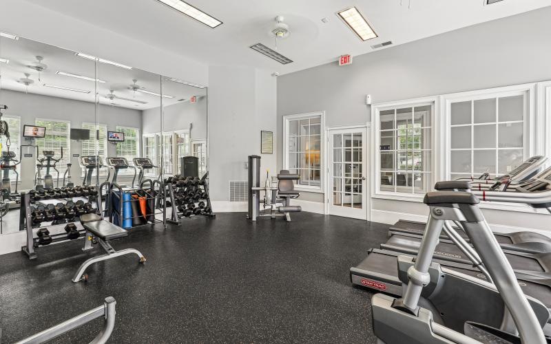 a room with treadmills and treadmills